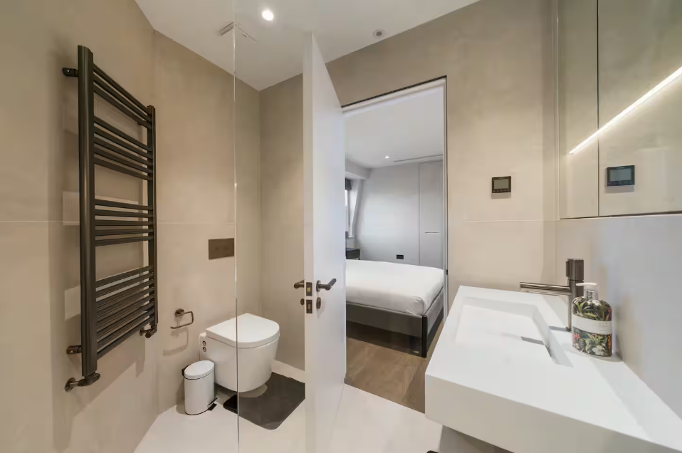 Luxury en suite bathroom with heated towel rail